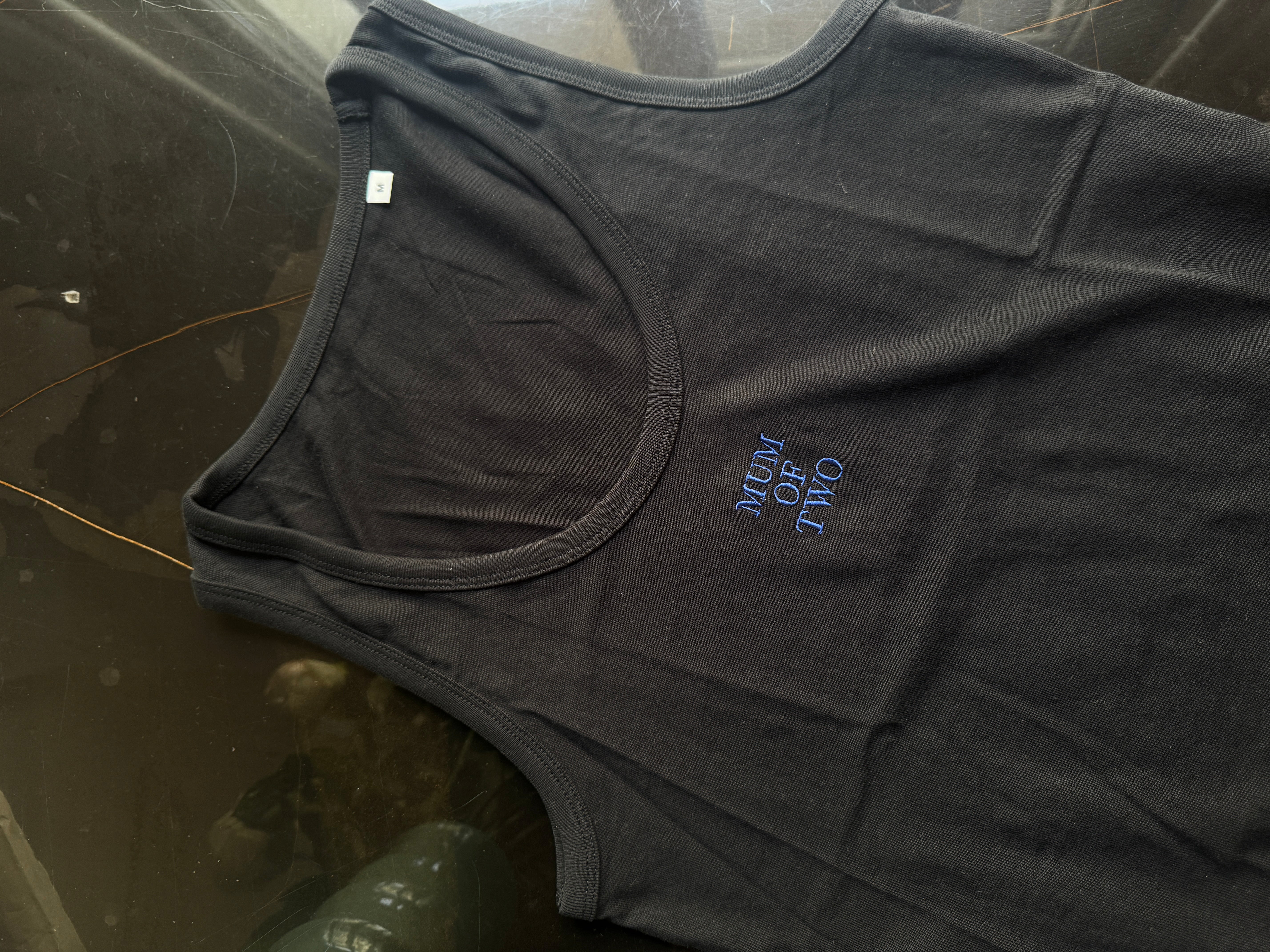 A BLACK EMBROIDERED MUM OF TWO TANK TOP